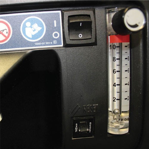 DeVilbiss oxygen concentrator control panel — power switch, flow meter and circuit-breaker reset button