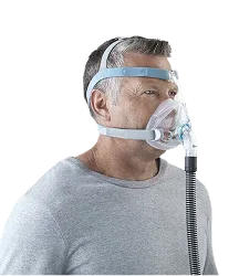Patient using respiratory equipment